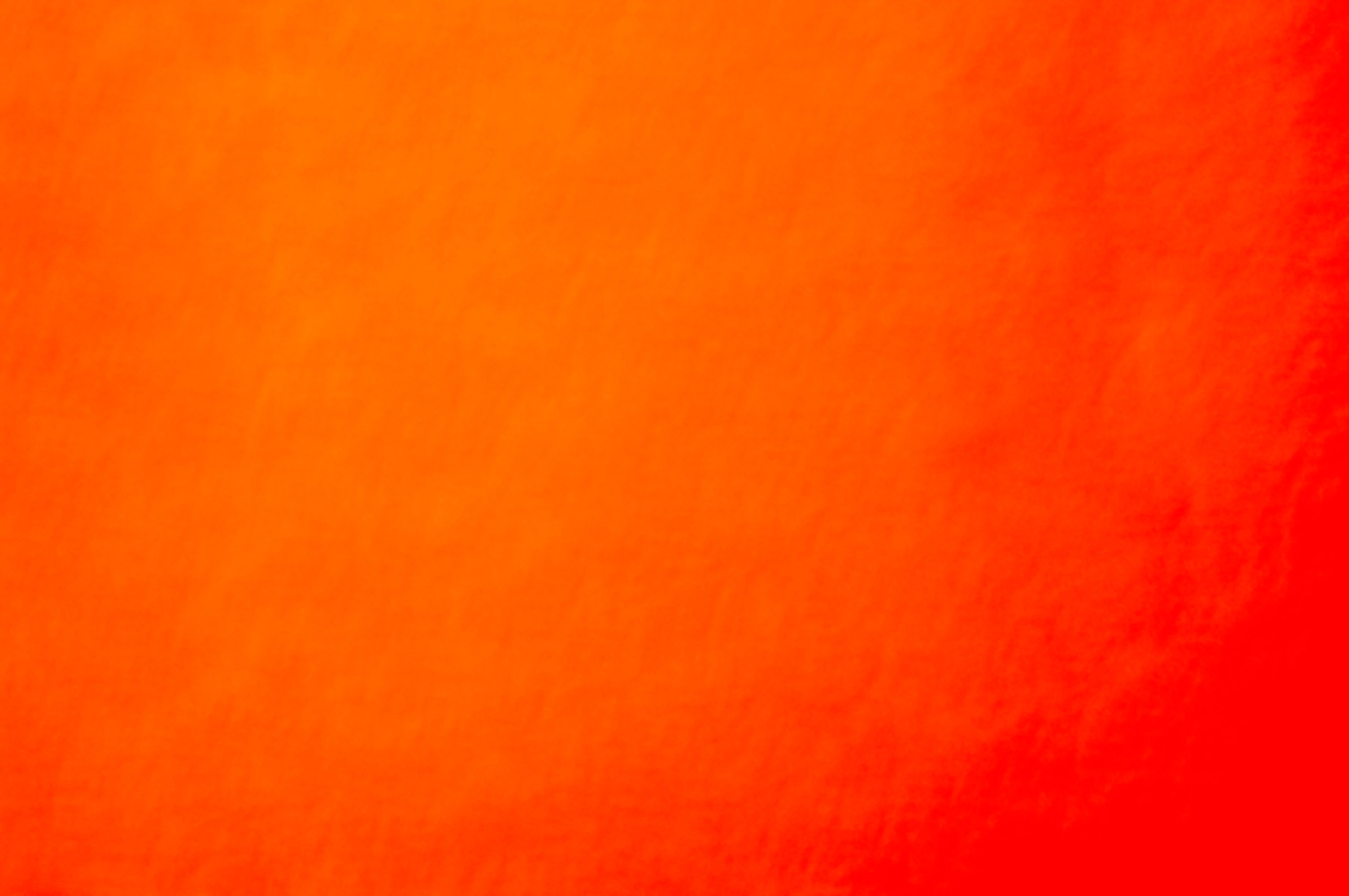 Red orange textured wall. Abstract gradient background.